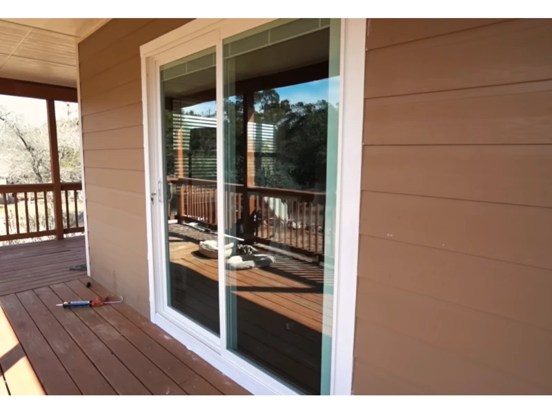 Sliding glass door glass panel repair and resealing during a Fort Myers sliding door repair service